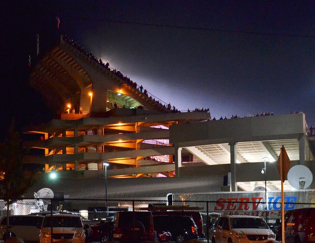Monday Night Football This Week: Pride, Playoff Position and One National Stage Floodlights shining over a football stadium at night