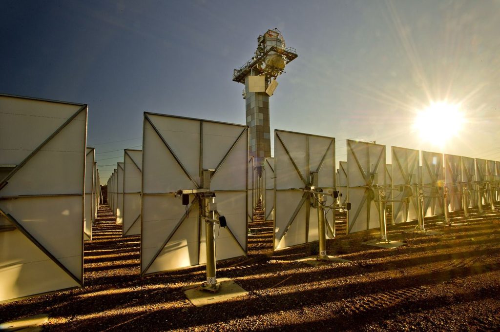Bitcoin Miners Sell Grid Flexibility Alongside Hashing Solar panels in a field
